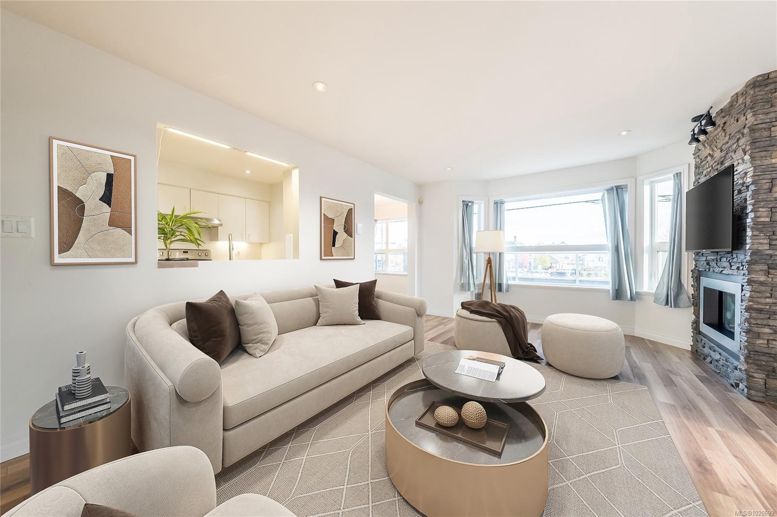 201-327 Prideaux St, Nanaimo, BC - Indoor Photo Showing Living Room With Fireplace