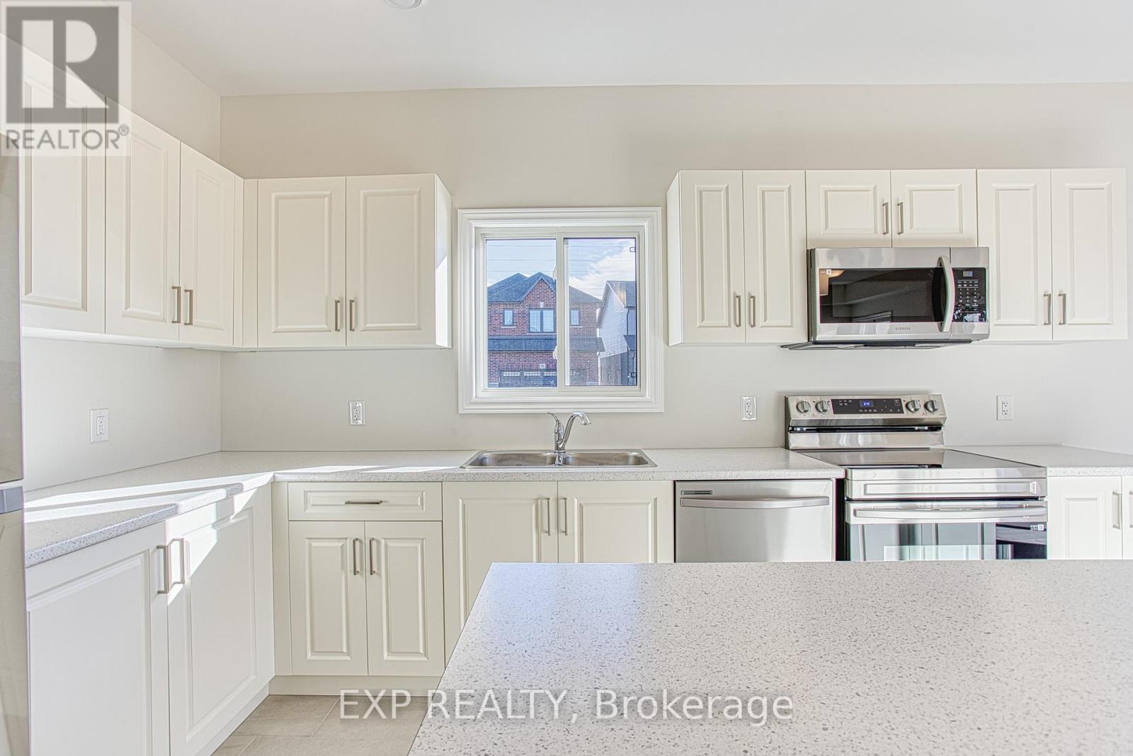 Upper - 20 Elvira Way, Thorold, ON - Indoor Photo Showing Kitchen With Double Sink