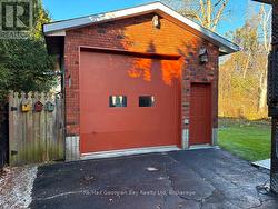 LARGE HEATED GARAGE/SHOP -