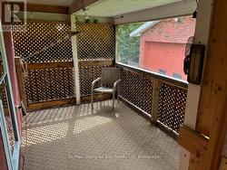 SCREENED COVERED PORCH OFF UPPER DINING AREA -