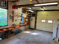 MAN DOOR TO WORK BENCH -