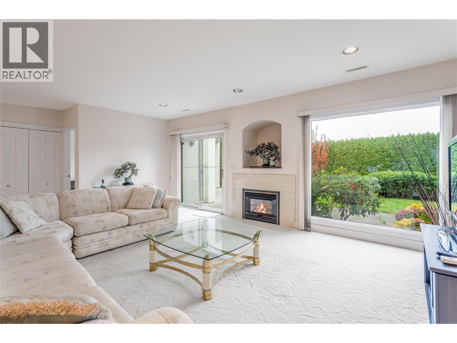 2545 Campbell Road, West Kelowna, BC - Indoor Photo Showing Living Room With Fireplace