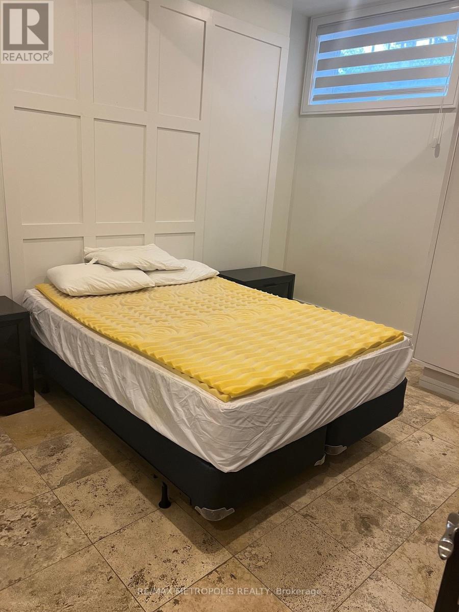 Lower - 94 Marilake Drive, Toronto, ON - Indoor Photo Showing Bedroom