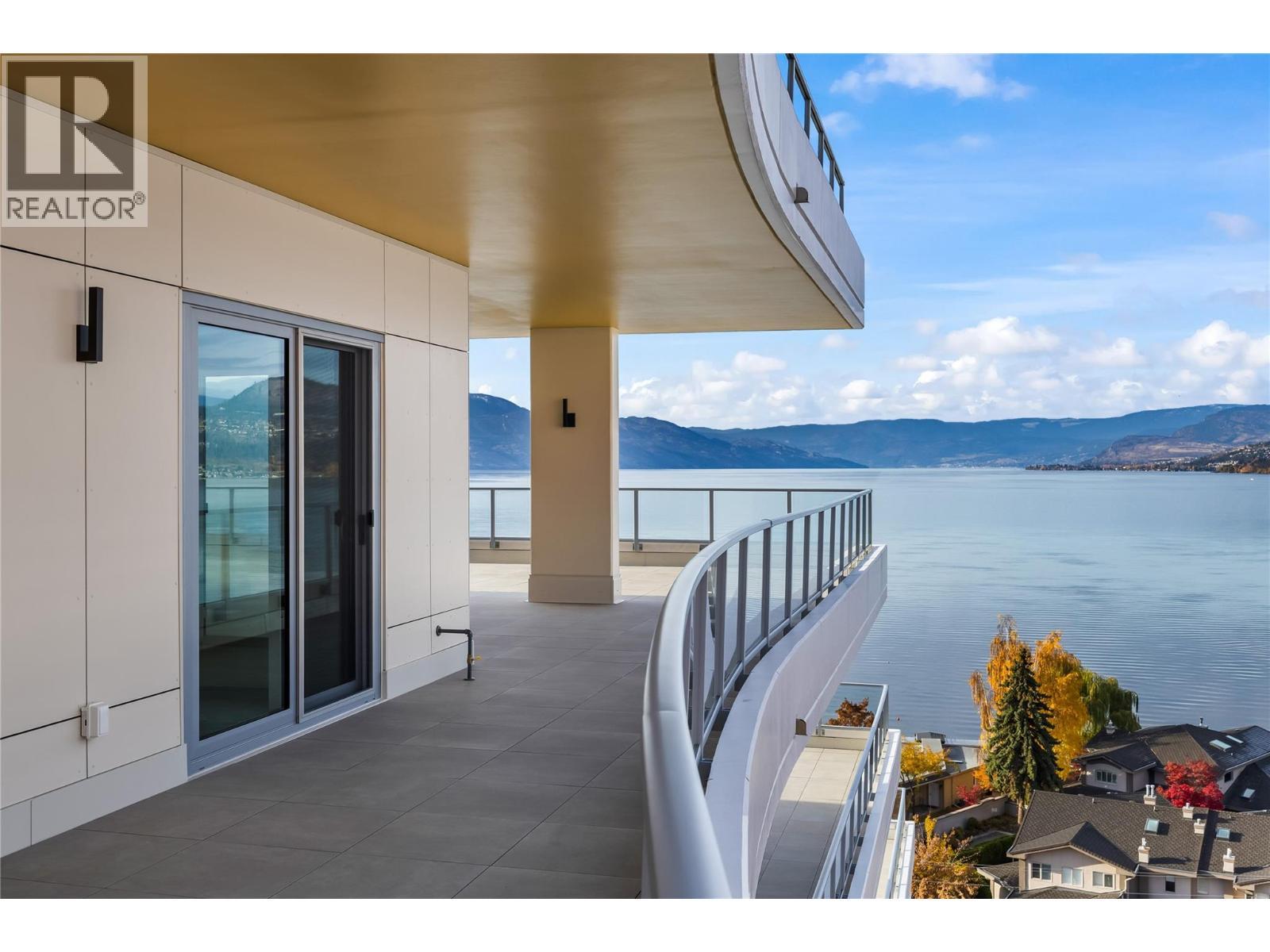 Wrap-around Terrace - 3340 Lakeshore Road Unit# 902, Kelowna, BC - Outdoor With Body Of Water With Exterior