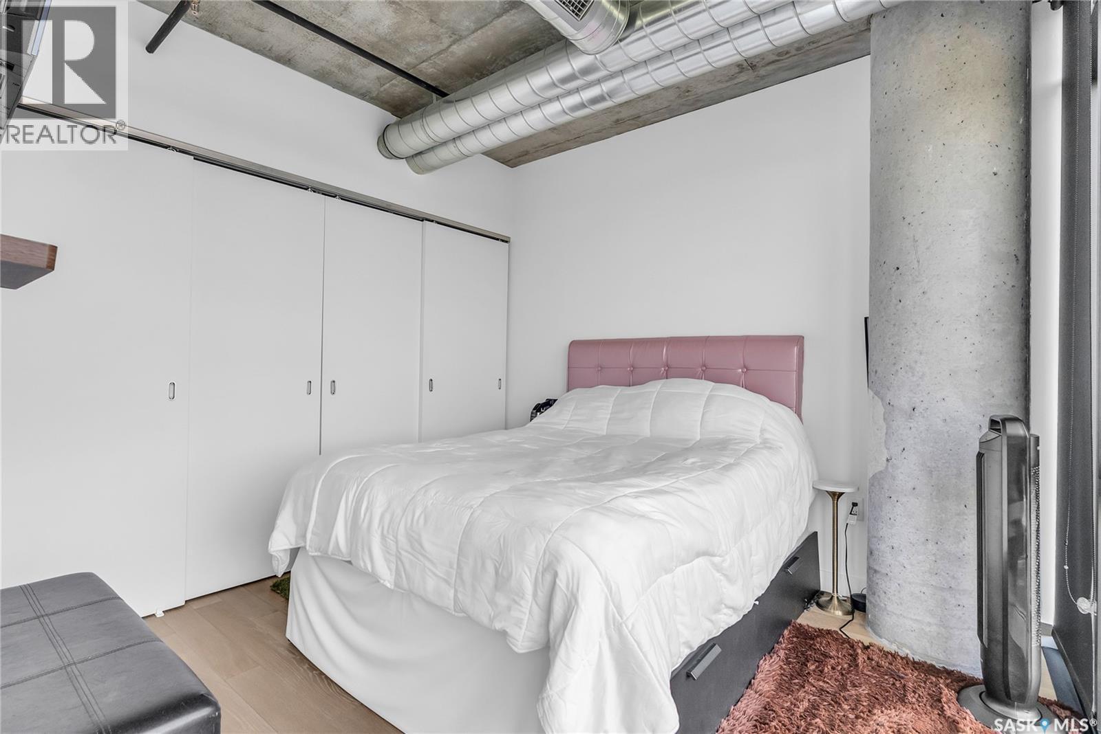 205 490 2Nd Avenue S, Saskatoon, SK - Indoor Photo Showing Bedroom