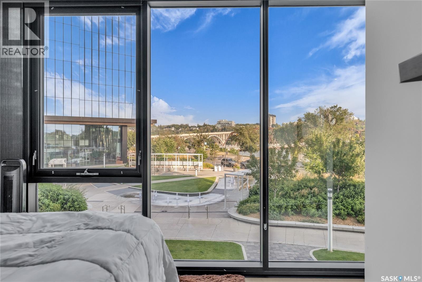 205 490 2Nd Avenue S, Saskatoon, SK - Indoor Photo Showing Bedroom