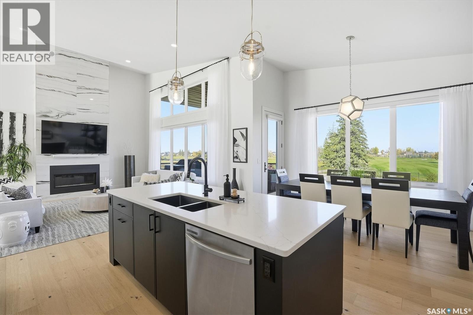 100 Greenbryre Crescent N, Corman Park Rm No. 344, SK - Indoor With Fireplace