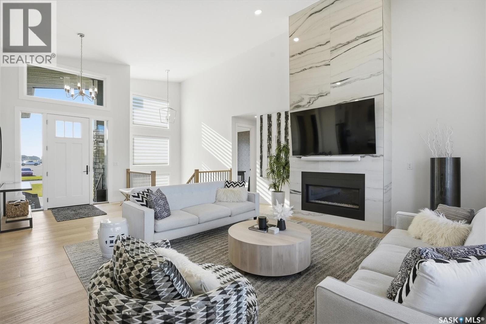 100 Greenbryre Crescent N, Corman Park Rm No. 344, SK - Indoor Photo Showing Living Room With Fireplace