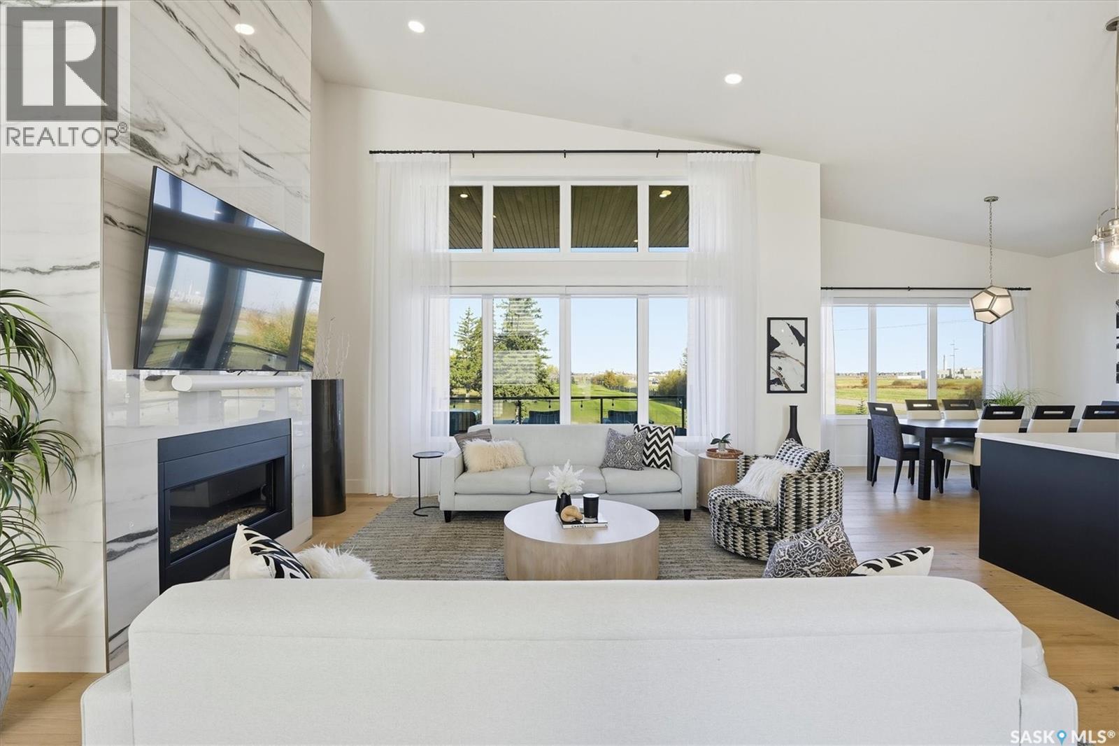 100 Greenbryre Crescent N, Corman Park Rm No. 344, SK - Indoor Photo Showing Living Room With Fireplace