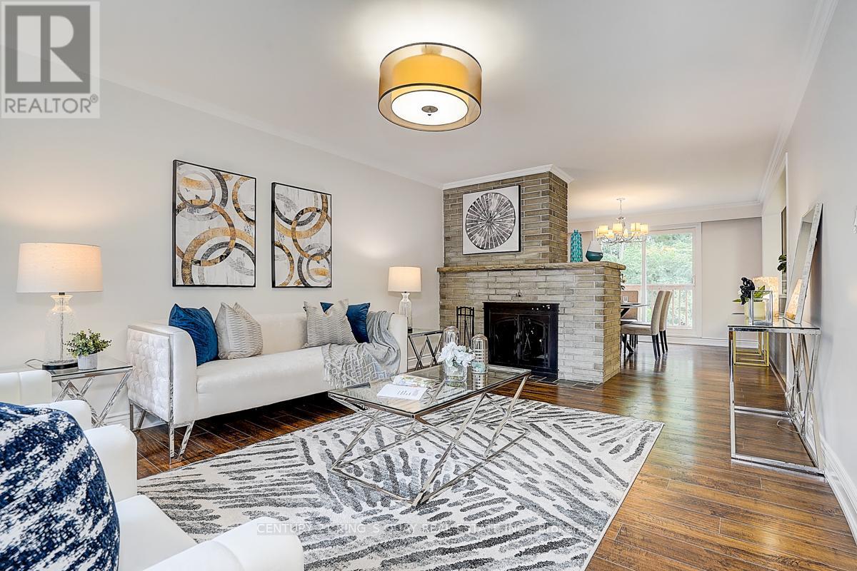 55 Three Valleys Drive, Toronto, ON - Indoor Photo Showing Living Room With Fireplace