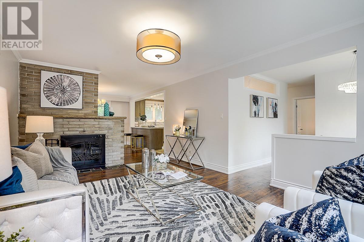 55 Three Valleys Drive, Toronto, ON - Indoor Photo Showing Living Room With Fireplace