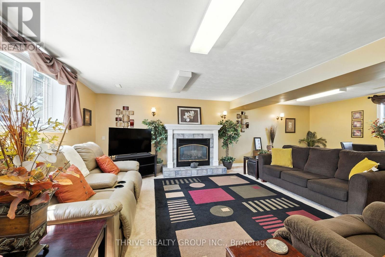 48118 Ron Mcneil Line, Malahide, ON - Indoor Photo Showing Living Room With Fireplace