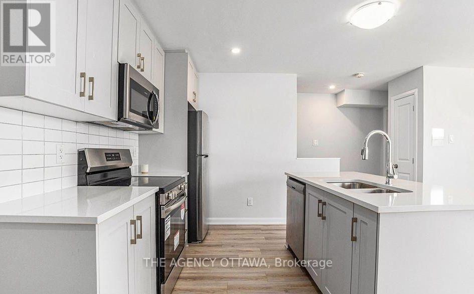 16 - 401 Glenroy Gilbert Drive, Ottawa, ON - Indoor Photo Showing Kitchen With Double Sink With Upgraded Kitchen