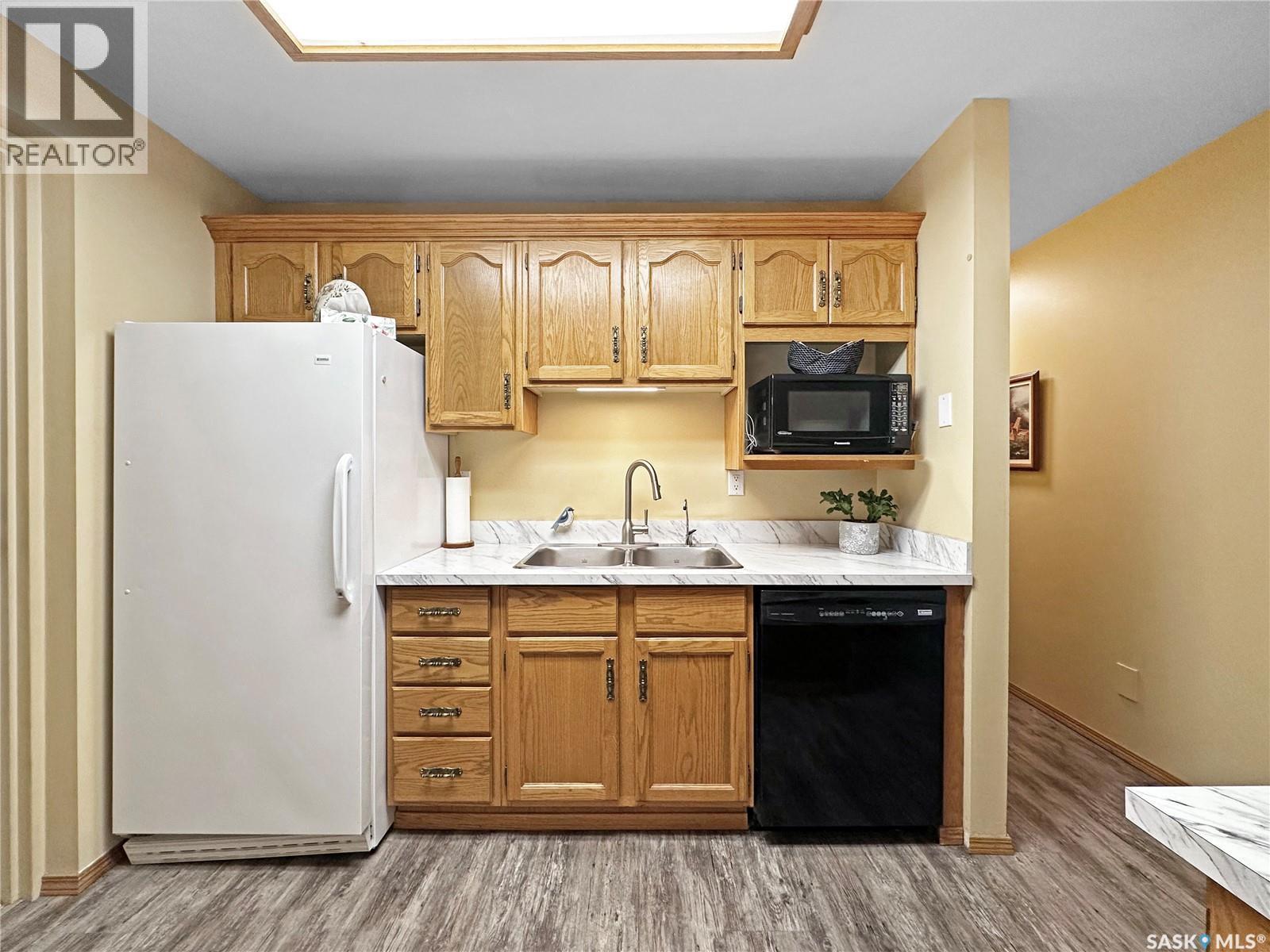 A1 532 River Street, Prince Albert, SK - Indoor Photo Showing Kitchen With Double Sink