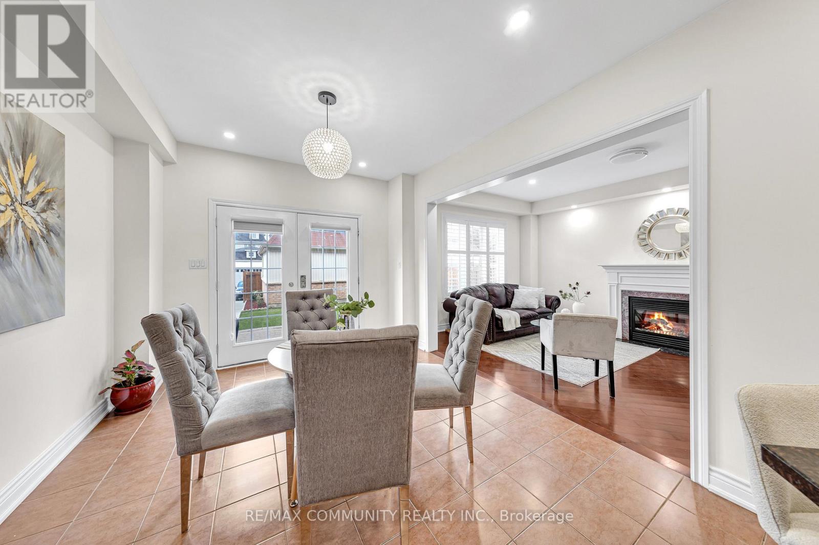 17 Rouge Bank Drive, Markham, ON - Indoor Photo Showing Dining Room With Fireplace