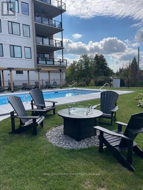 407 - 19B West Street N, Kawartha Lakes, ON - Outdoor With In Ground Pool With Backyard