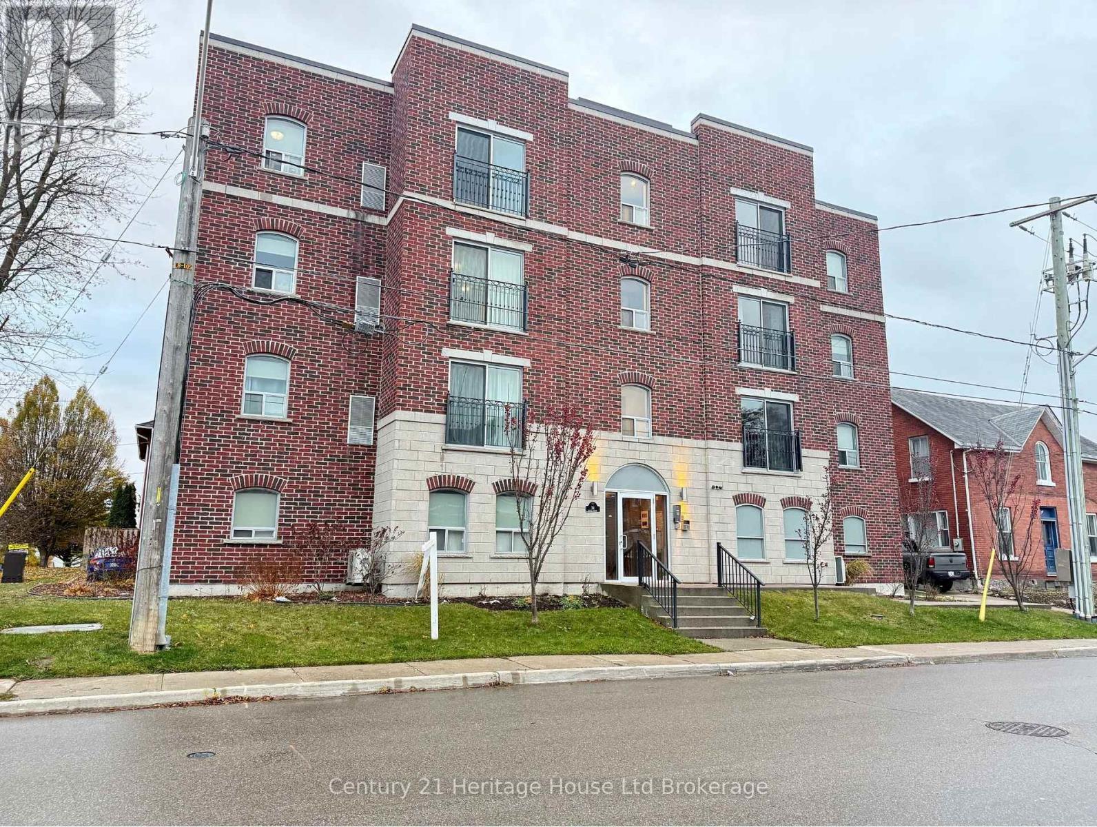 303 - 34 Brock Street, Woodstock (Woodstock - South), ON - Outdoor With Facade