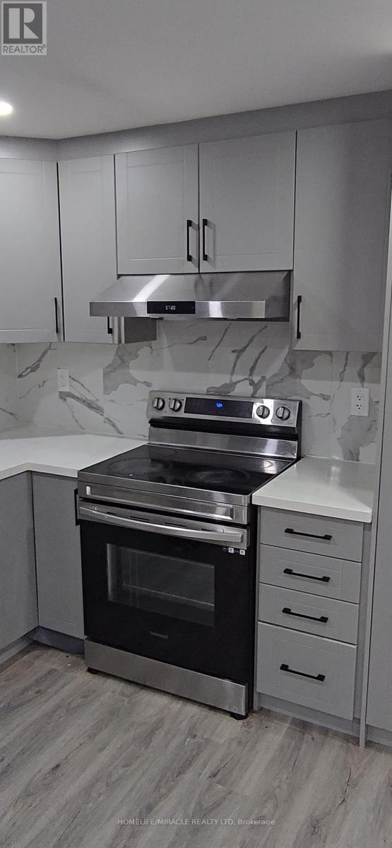 Basement Apartment - 23 Elverton Crescent, Brampton, ON - Indoor Photo Showing Kitchen