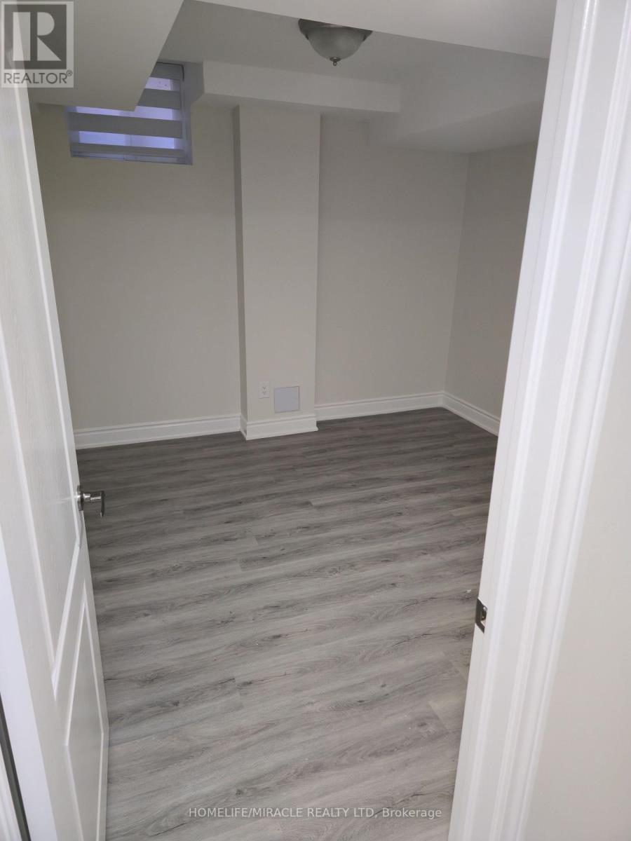 Basement Apartment - 23 Elverton Crescent, Brampton, ON - Indoor Photo Showing Other Room