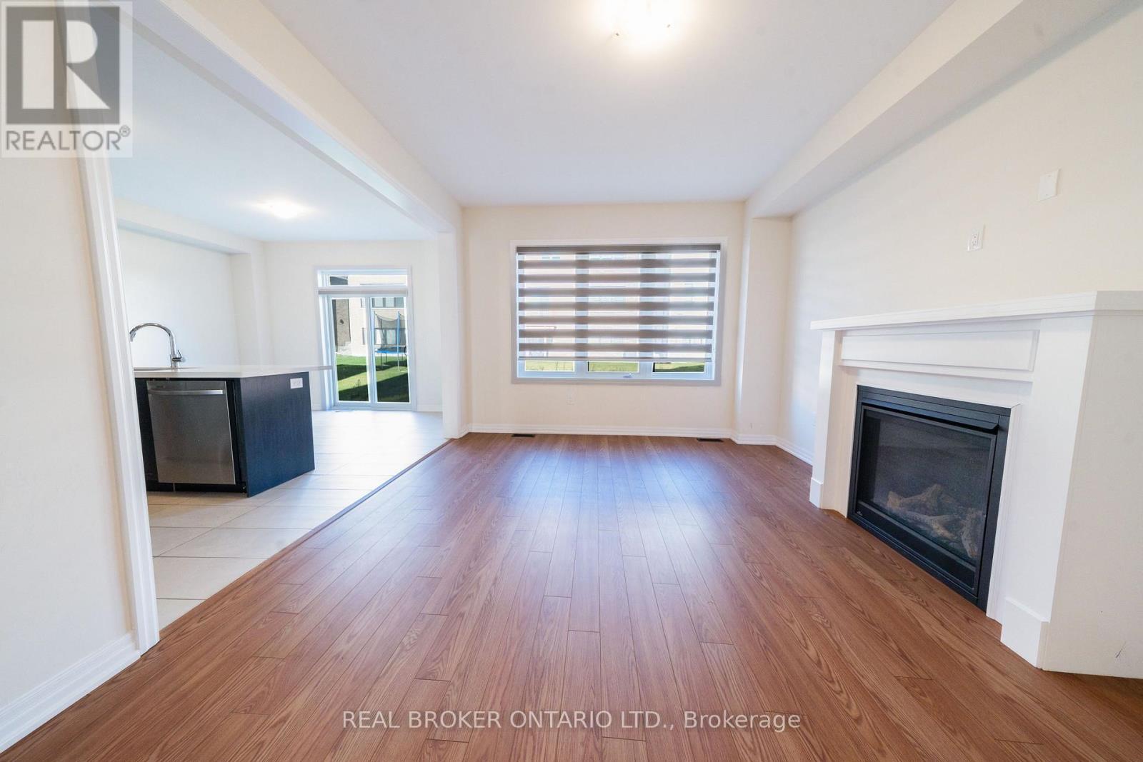 6 Northrop Avenue N, Clarington, ON - Indoor Photo Showing Living Room With Fireplace