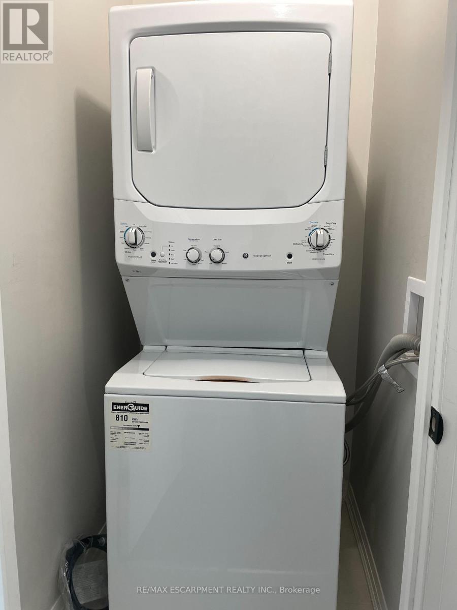 502 - 102 Grovewood Common, Oakville, ON - Indoor Photo Showing Laundry Room