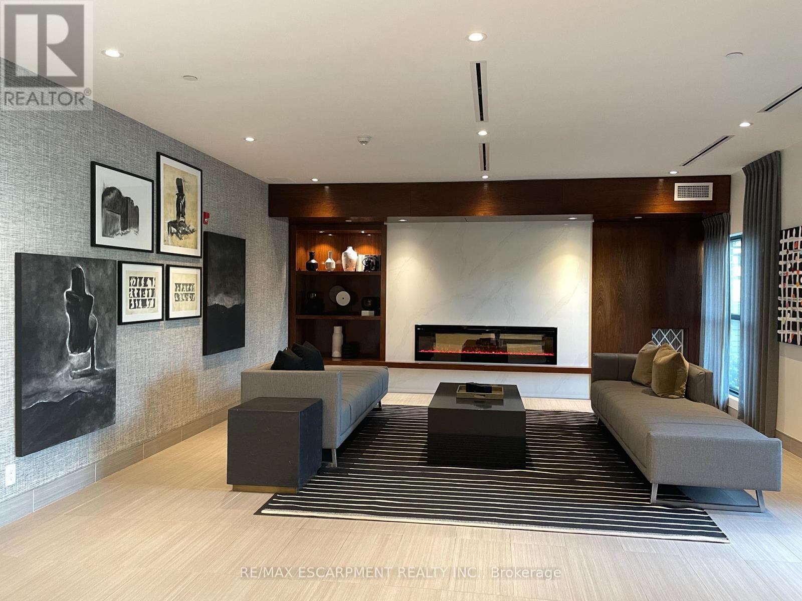 502 - 102 Grovewood Common, Oakville, ON - Indoor With Fireplace