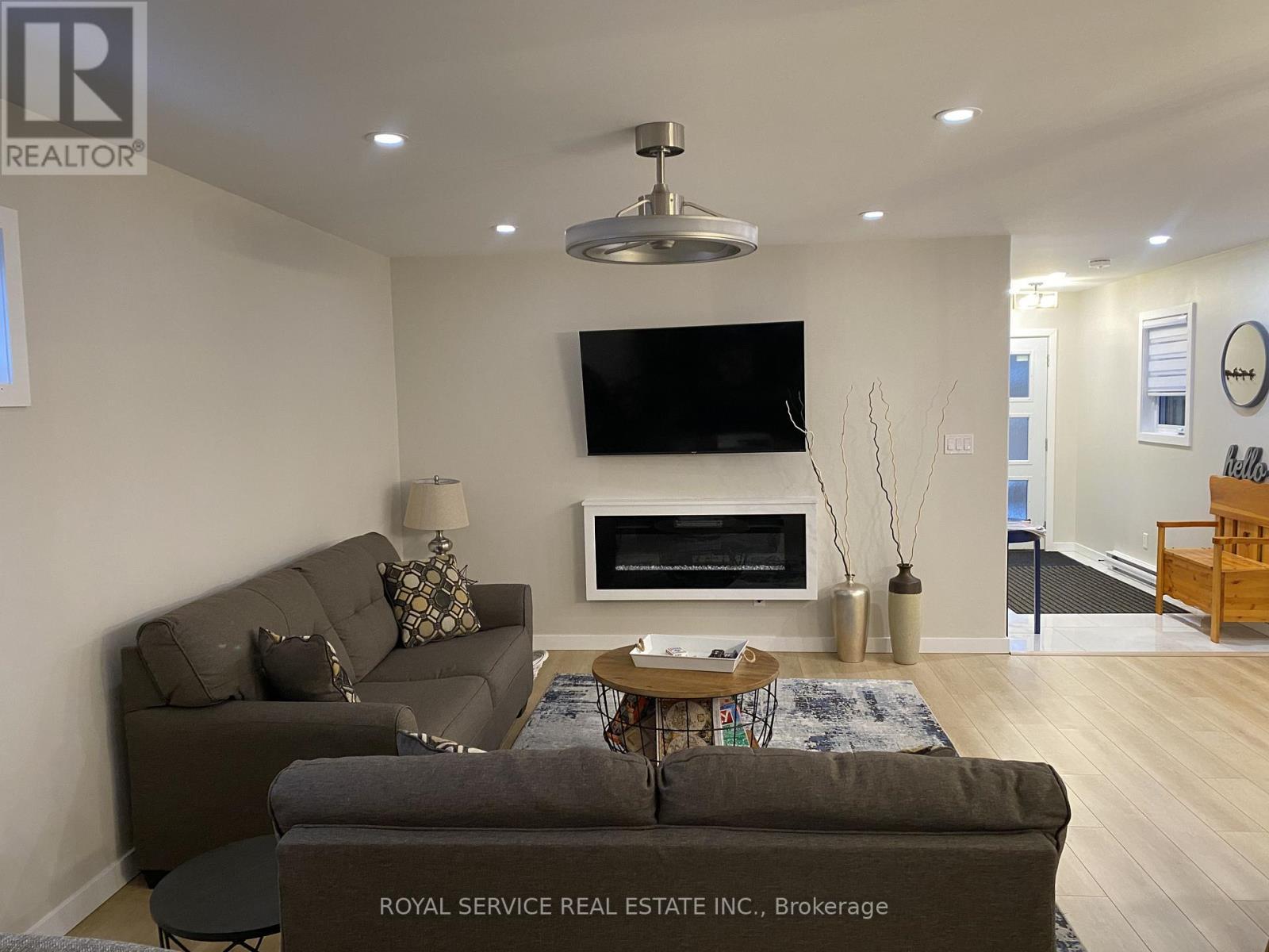 50 Cedar Shores Drive, Trent Hills, ON - Indoor Photo Showing Living Room With Fireplace