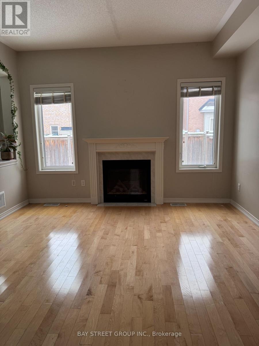 3196 Tim Dobbie Drive, Burlington, ON - Indoor Photo Showing Living Room With Fireplace