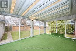 Sunroom / Putting Green -