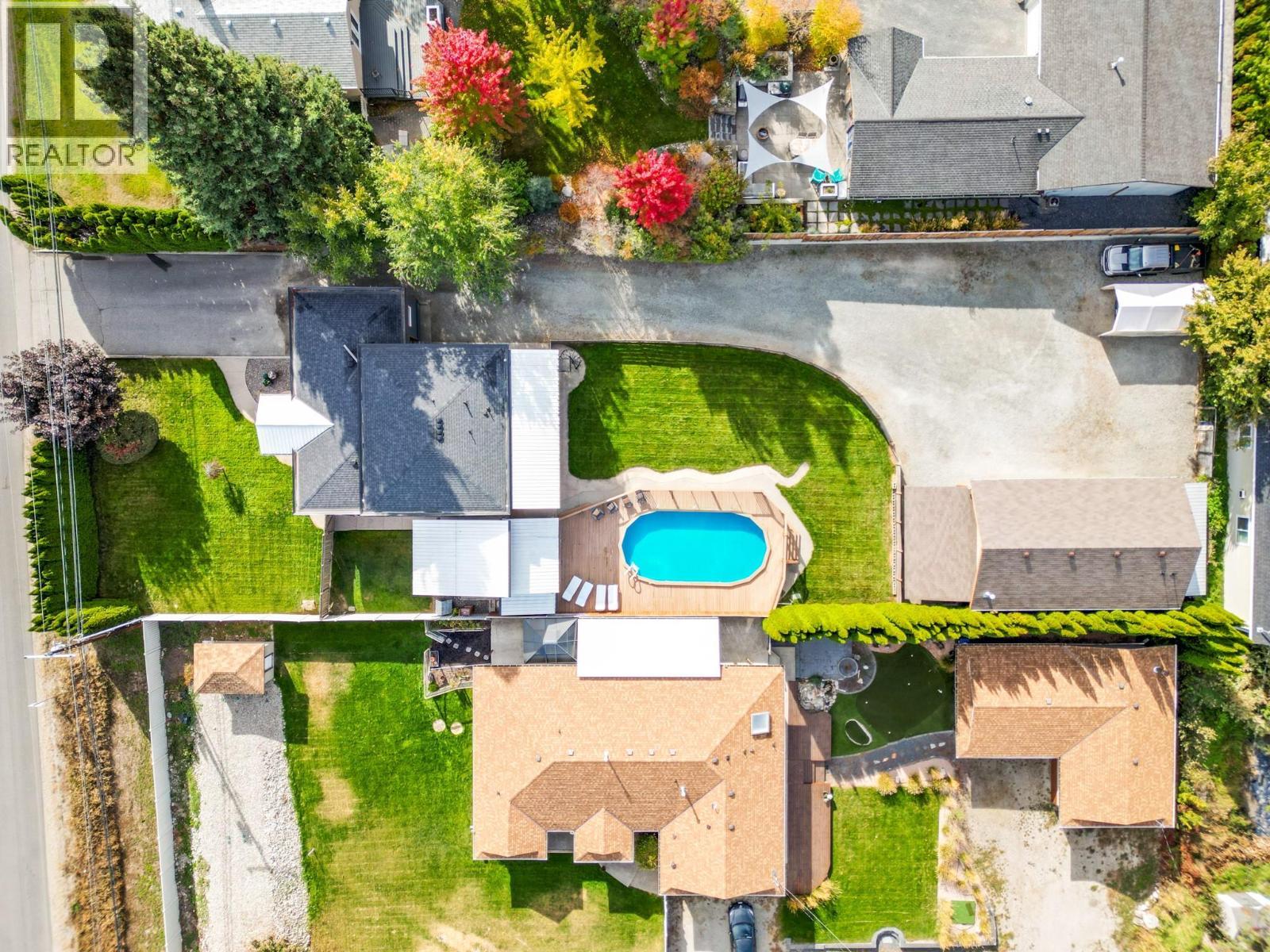 3588 Spiers Road, Kelowna, BC - Outdoor With Above Ground Pool