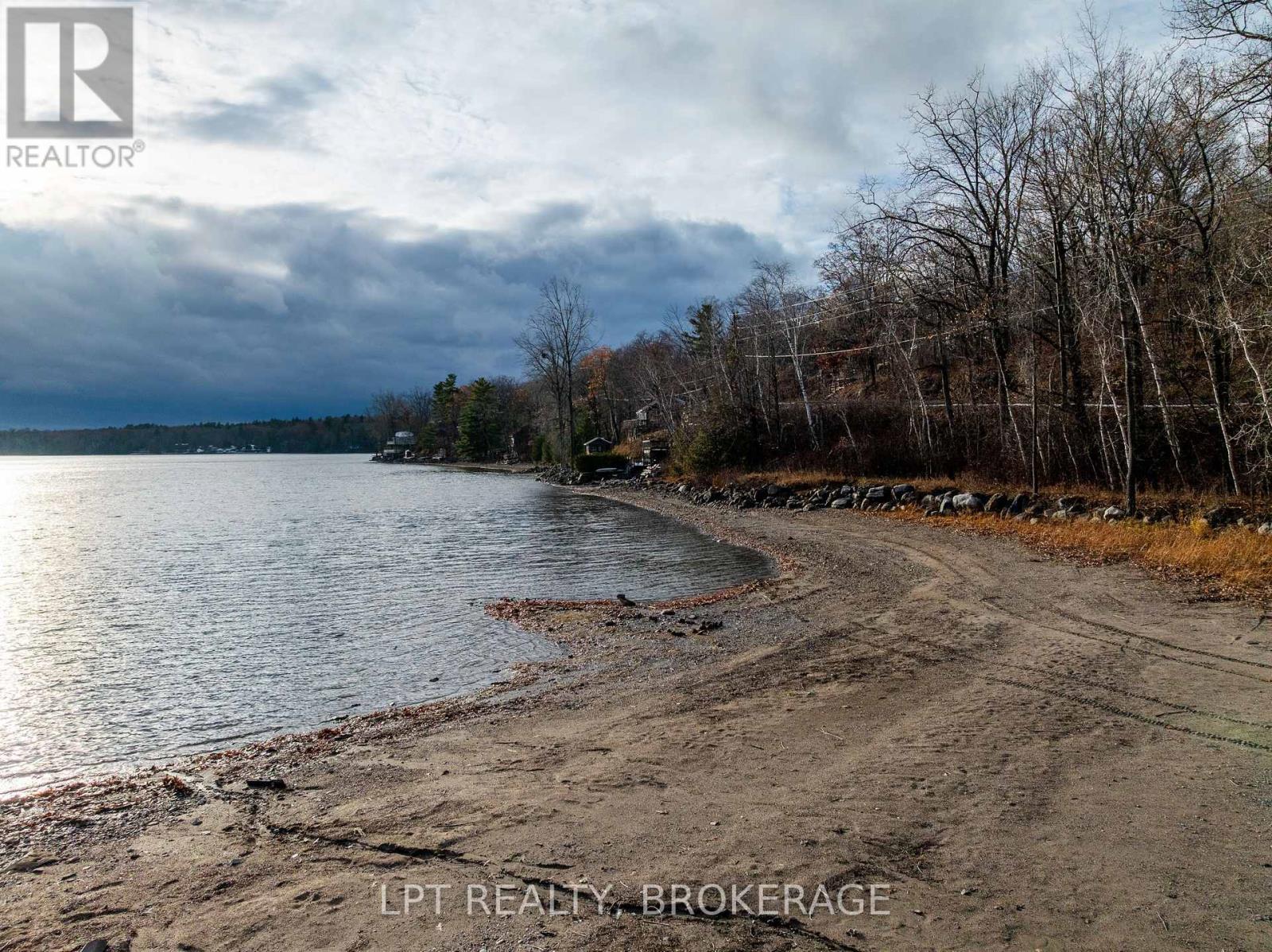 2 Minute Walk to Beach and Boat Launch - 1857 Crow Lake Road, Frontenac (Frontenac Centre), ON - Outdoor With Body Of Water With View