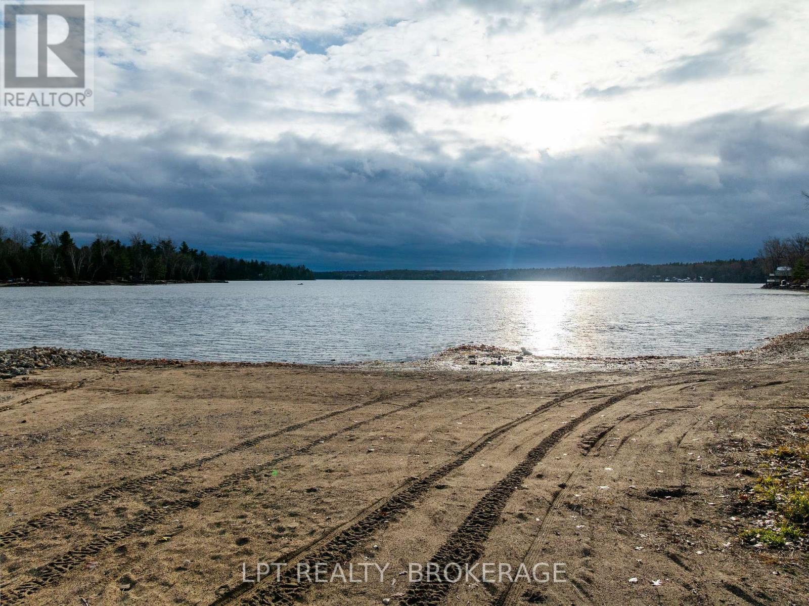 2 Minute Walk to Beach and Boat Launch - 1857 Crow Lake Road, Frontenac (Frontenac Centre), ON - Outdoor With Body Of Water With View