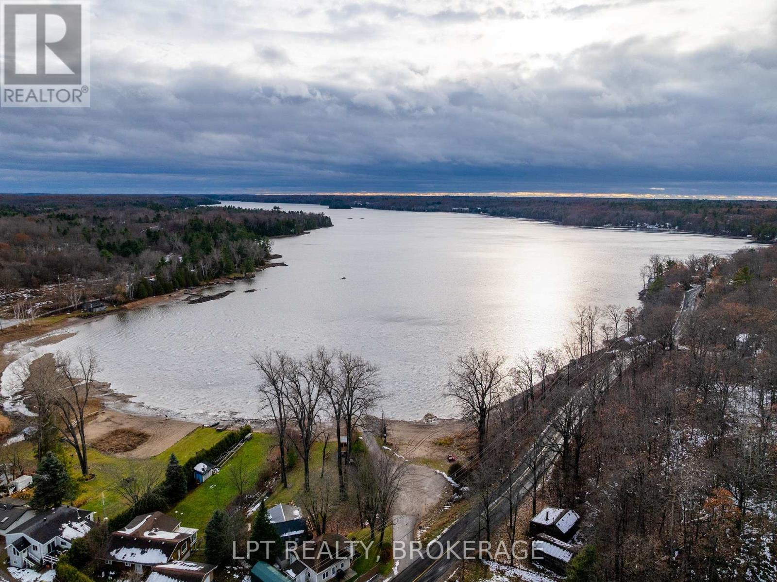 2 Minute Walk to Beach and Boat Launch - 1857 Crow Lake Road, Frontenac (Frontenac Centre), ON - Outdoor With Body Of Water With View