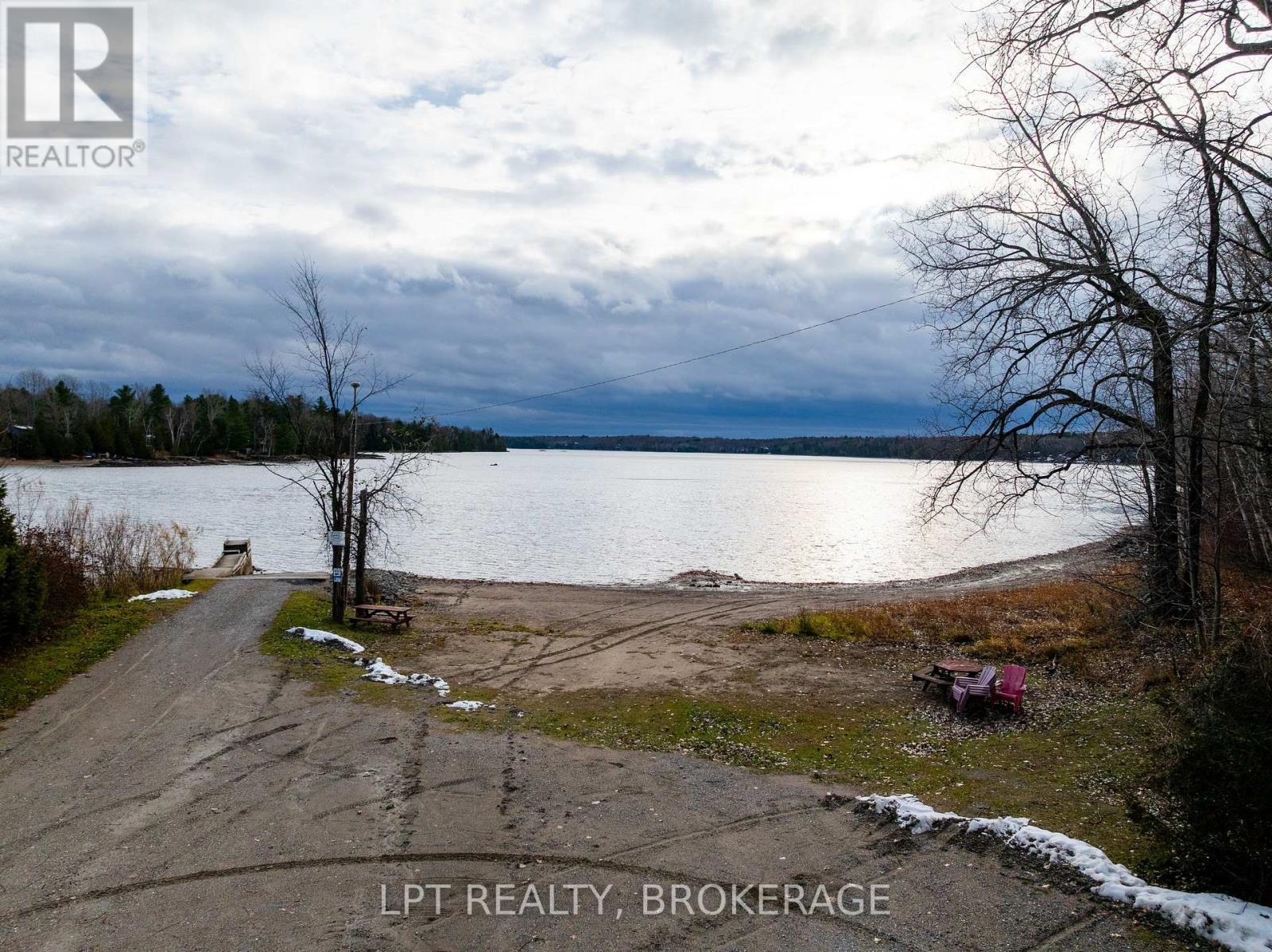 2 Minute Walk to Beach and Boat Launch - 1857 Crow Lake Road, Frontenac (Frontenac Centre), ON - Outdoor With Body Of Water With View