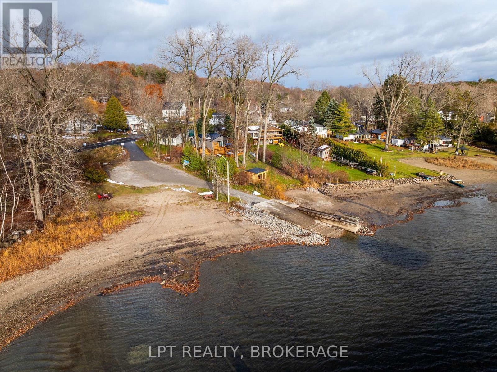 2 Minute Walk to Beach and Boat Launch - 1857 Crow Lake Road, Frontenac (Frontenac Centre), ON - Outdoor With Body Of Water With View