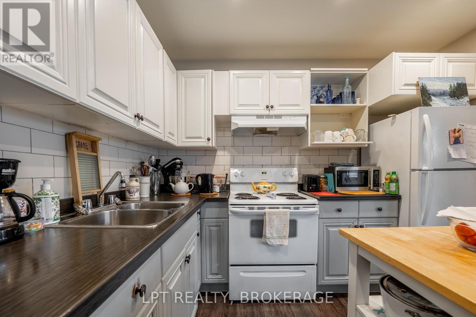 Middle Unit - 1857 Crow Lake Road, Frontenac (Frontenac Centre), ON - Indoor Photo Showing Kitchen With Double Sink
