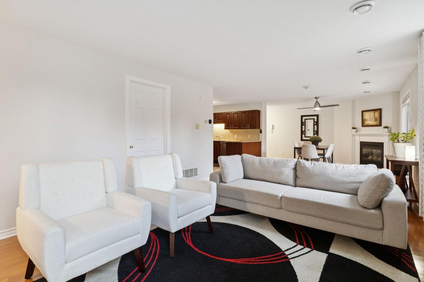 Salon - 101-97 Rue Ernest-Gaboury, Gatineau (Gatineau), QC - Indoor Photo Showing Living Room With Fireplace