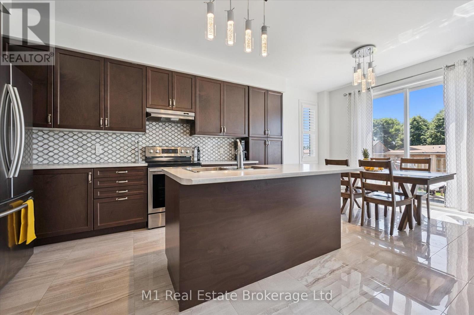 19 Findlay Way, Centre Wellington (Fergus), ON - Indoor Photo Showing Kitchen With Double Sink