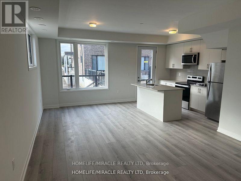 02 - 3415 Ridgeway Drive, Mississauga, ON - Indoor Photo Showing Kitchen With Stainless Steel Kitchen