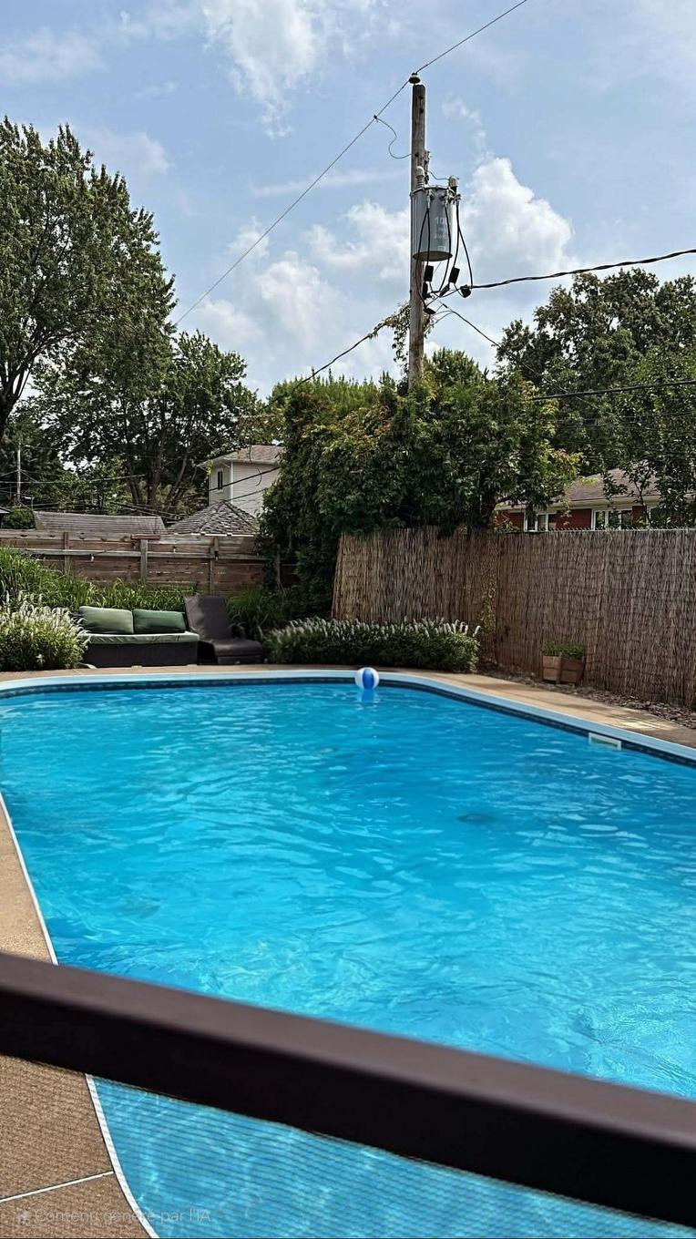 Pool - 54 Rue De La Concorde, Repentigny (Repentigny), QC - Outdoor With In Ground Pool With Backyard