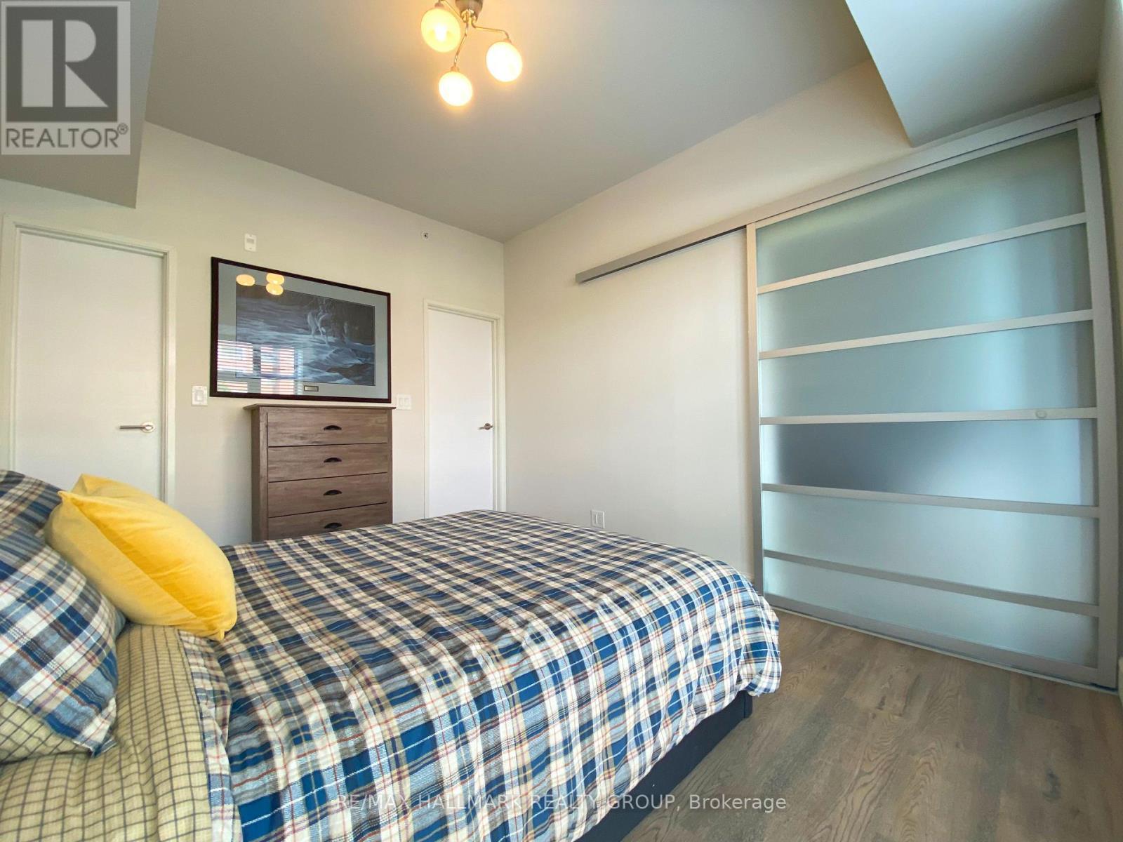 Walk-in-closet & cheater door to bath - 208 - 555 Anand Private, Ottawa, ON - Indoor Photo Showing Bedroom