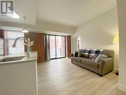 High ceilings & exposed brick wall -