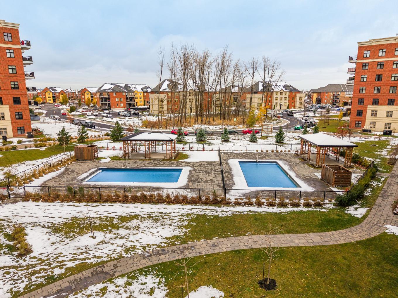 Aerial photo - 310-9175 Rue Lennon, Brossard, QC - Outdoor With In Ground Pool