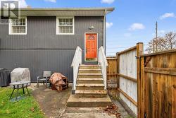 Entrance to upper level Apartment -