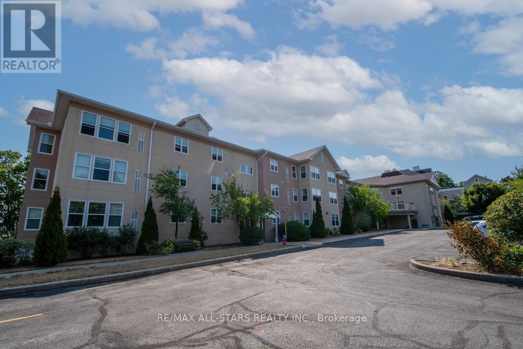 106 - 8 Huron Street, Kawartha Lakes (Lindsay), ON - Outdoor With Facade