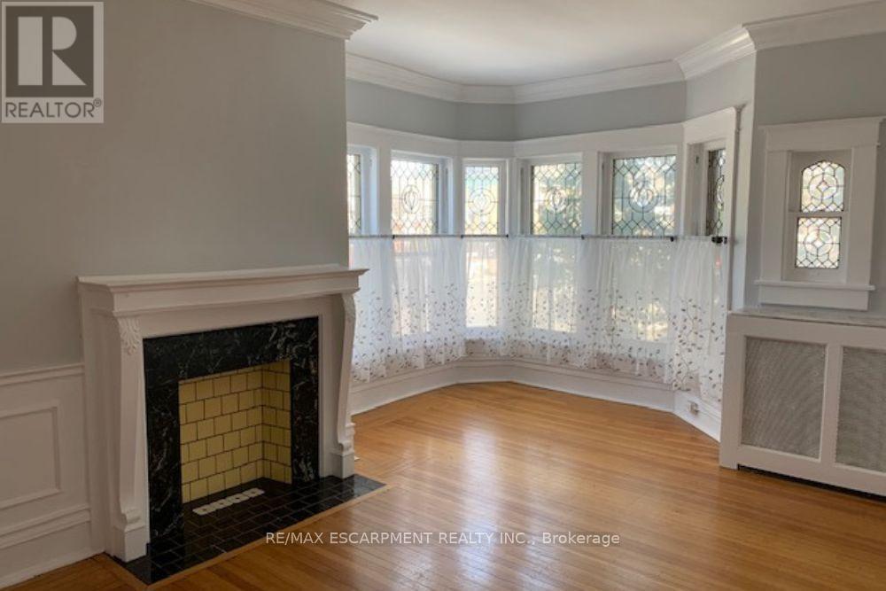 1 - 2 Undermount Avenue, Hamilton, ON - Indoor With Fireplace