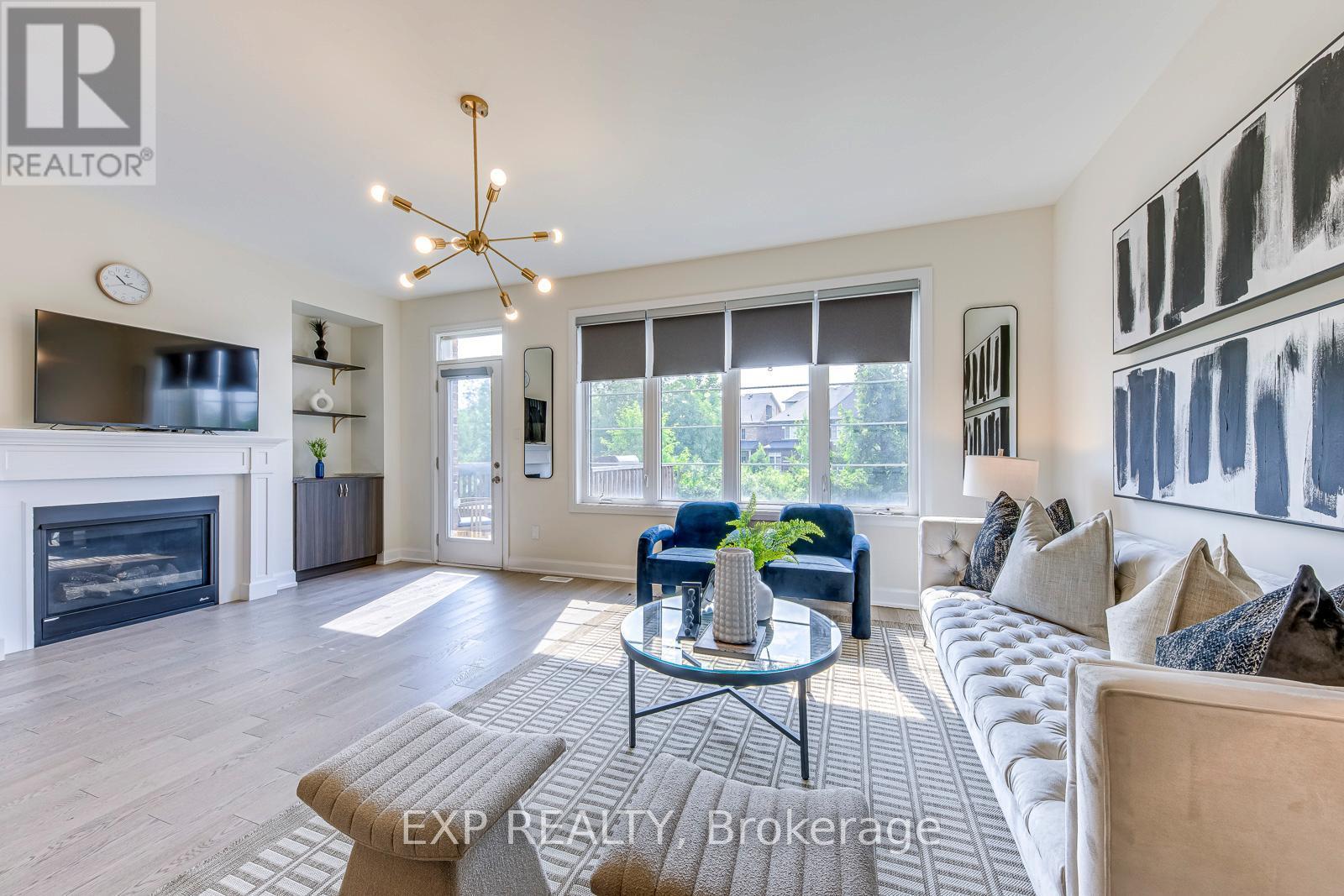 18 - 3129 Riverpath Common, Oakville, ON - Indoor Photo Showing Living Room With Fireplace