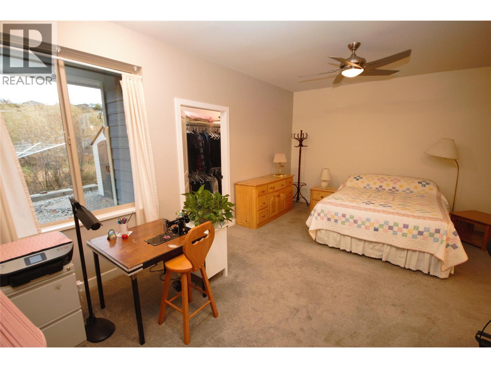 Primary Bedroom - 131 Willows Place, Oliver, BC - Indoor Photo Showing Bedroom