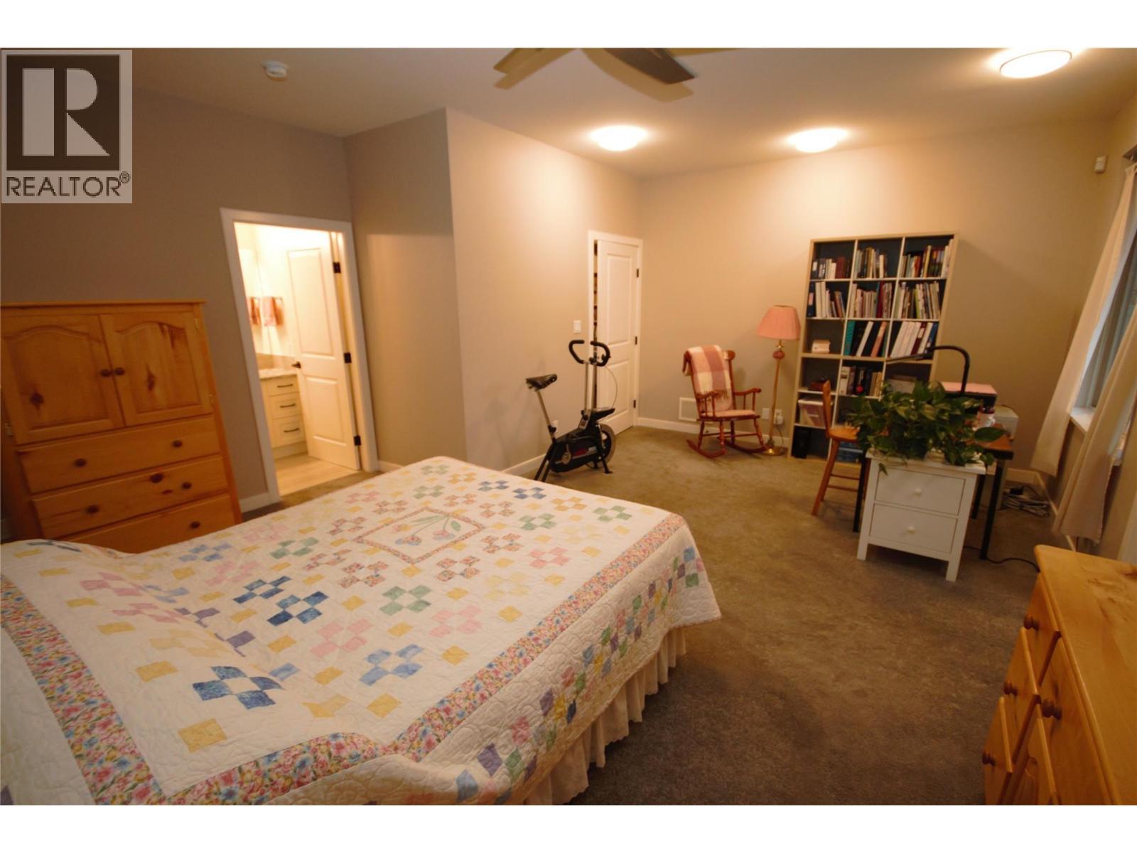 Primary Bedroom - 131 Willows Place, Oliver, BC - Indoor Photo Showing Bedroom