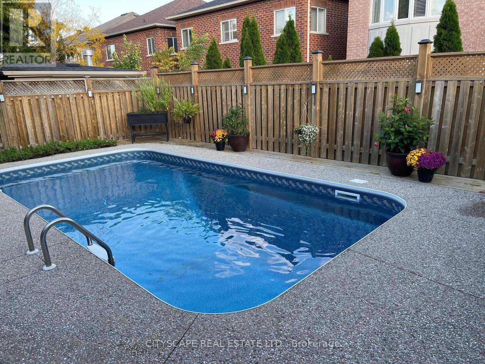 2449 Auckland Drive, Burlington, ON - Outdoor With In Ground Pool